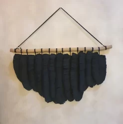 Decoratieve veren voor aan de muur