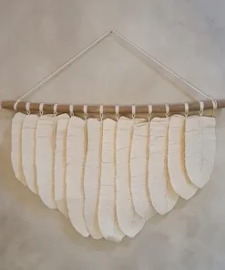 Decoratieve veren voor aan de muur